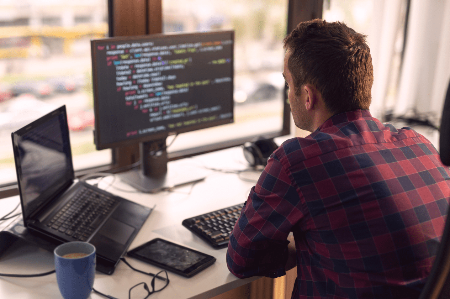 IT Outsourcing: Definition, Benefits, and Costs